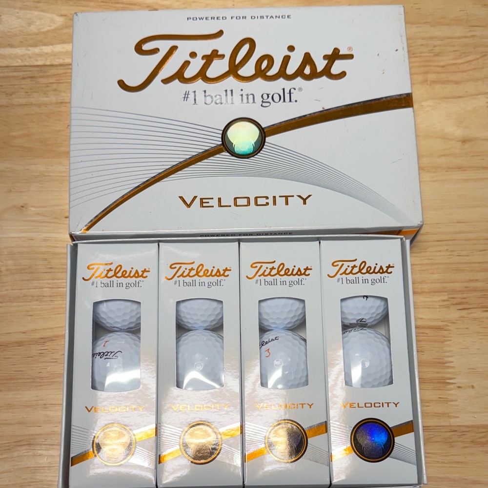 Titleist Velocity Golf Balls in White and Gold